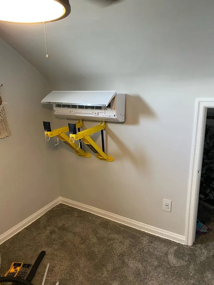 Slide of Johnny’s Mechanical Services