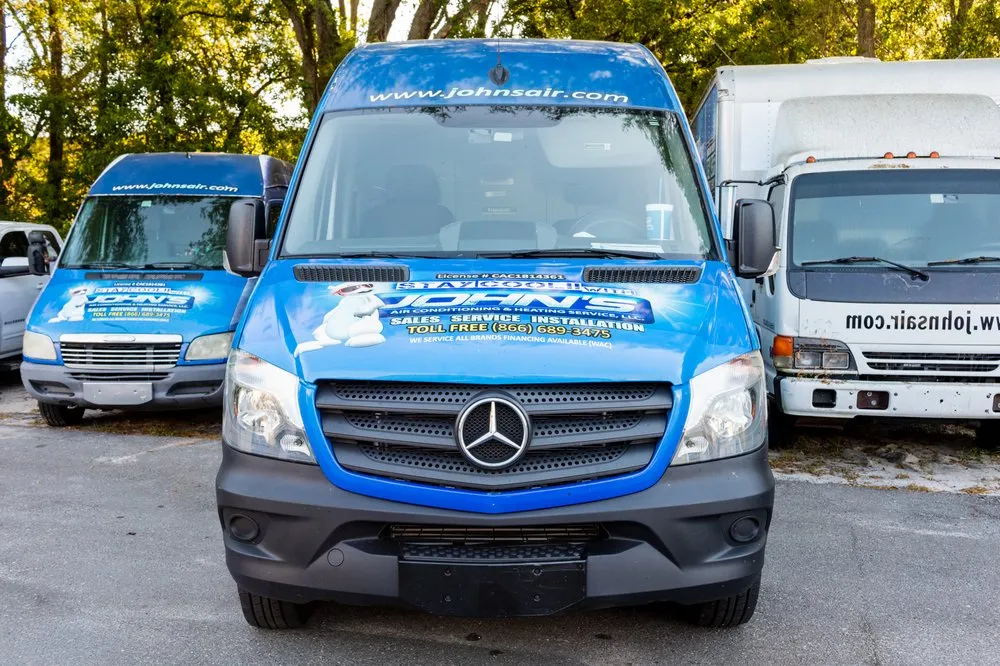 Slide of John's Air Conditioning and Heating Service