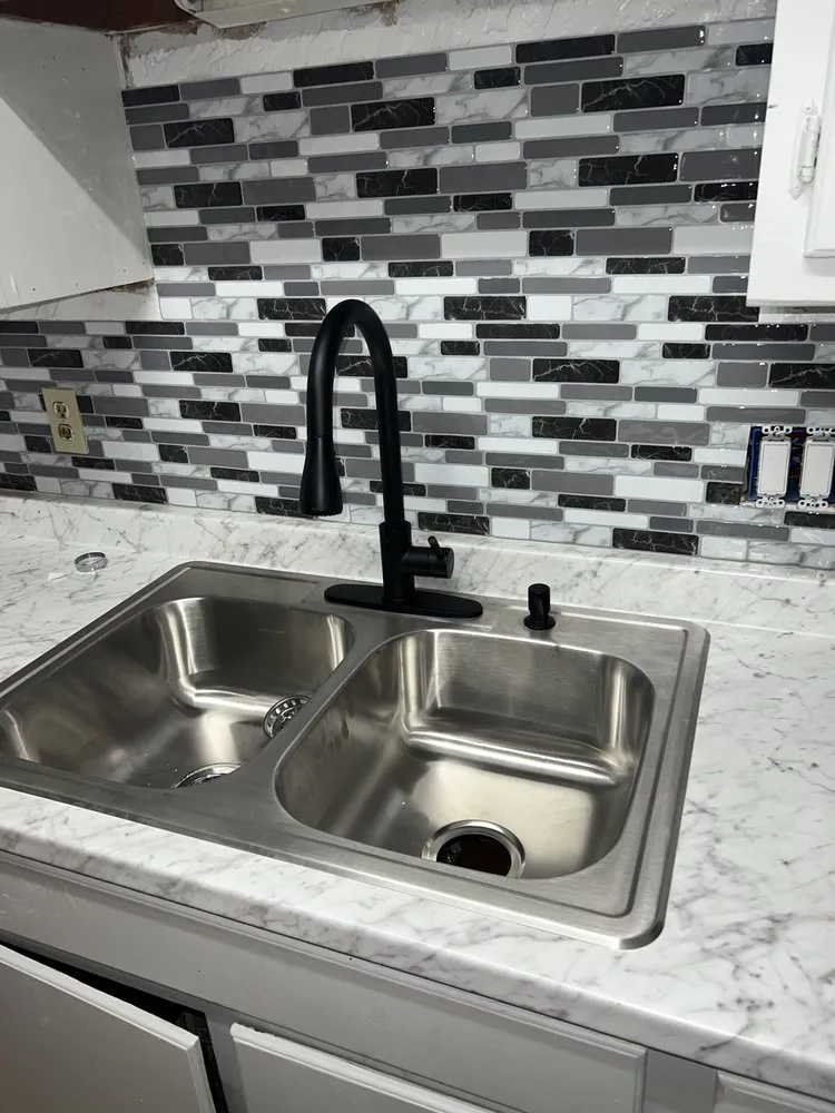 Slide of JTM Plumbing