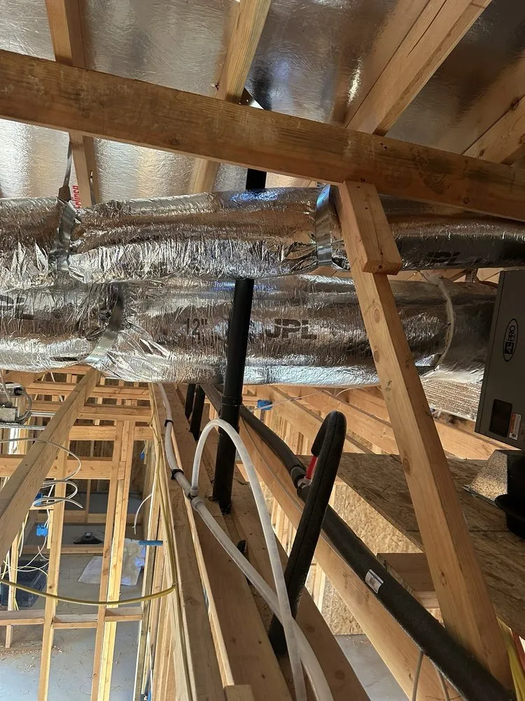 Slide of Juniors Ducting Services