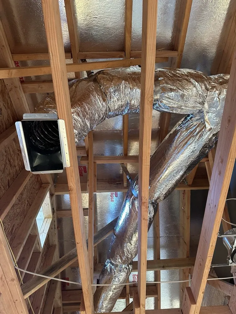 Slide of Juniors Ducting Services