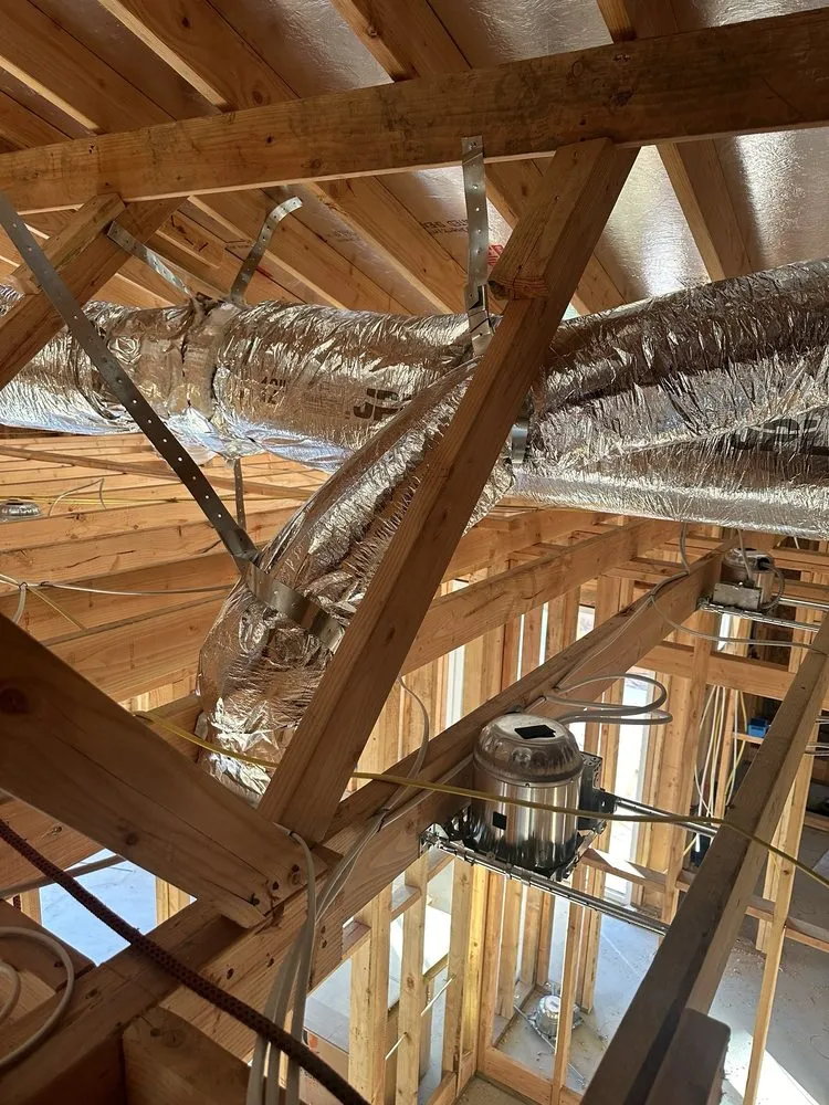 Slide of Juniors Ducting Services