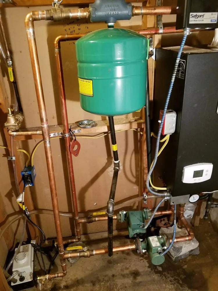 Slide of Just US Mechanics Plumbing Heating Air