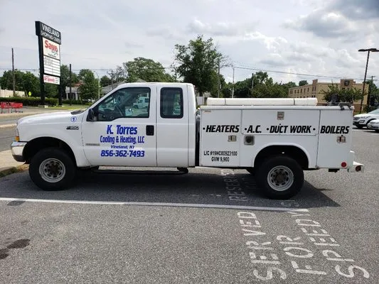 K. Torres Cooling & Heating Logo
