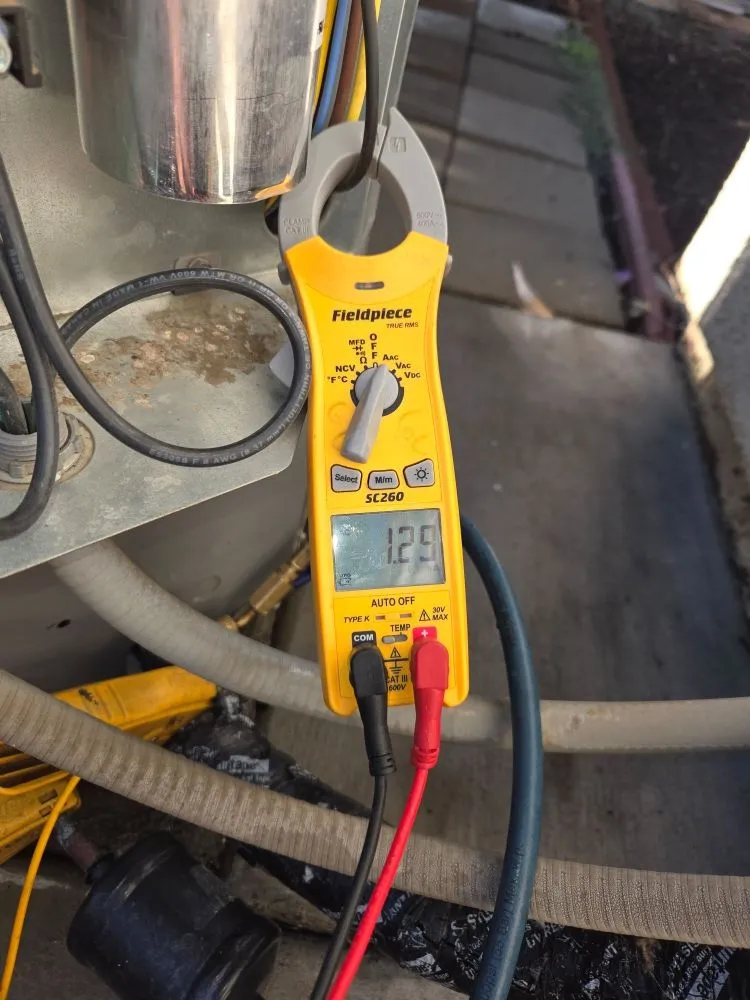 Slide of Kelly Kooling & Heating