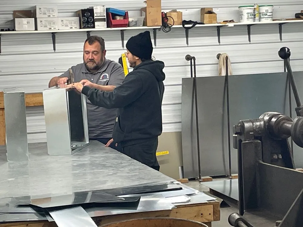 Slide of Kens Adams Mechanical