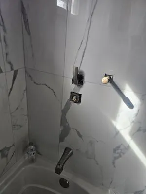 KJM Plumbing & Heating LLC Logo