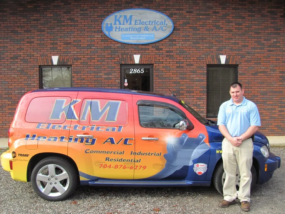 Slide of KM Electrical Heating & AC