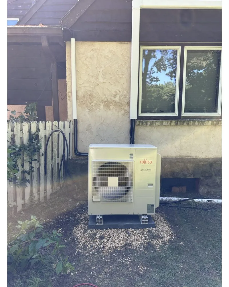 Slide of K.M. Gomes & Sons HVAC Professionals