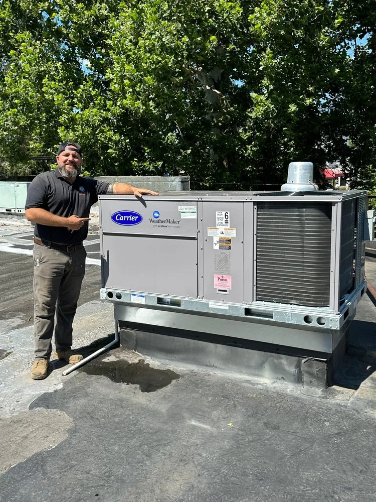 Slide of K.M. Gomes & Sons HVAC Professionals