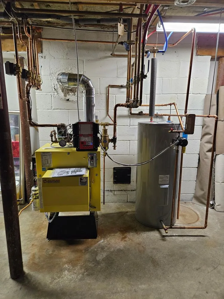 Slide of K.M. Gomes & Sons HVAC Professionals