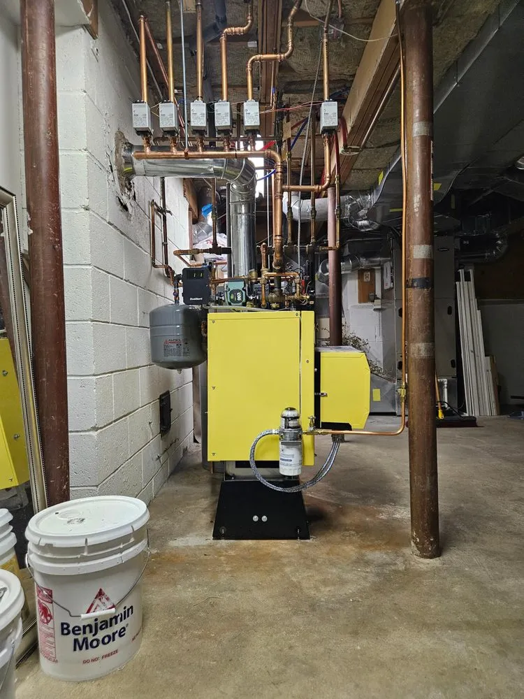 Slide of K.M. Gomes & Sons HVAC Professionals