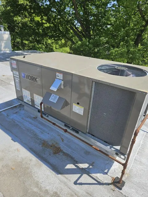 Slide of KOM Heating & Cooling