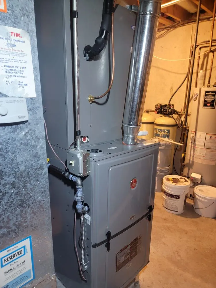 Slide of KOM Heating & Cooling