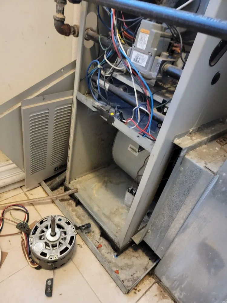 Slide of KOM Heating & Cooling