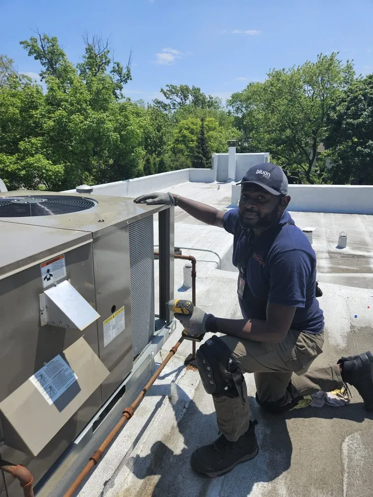 Slide of KOM Heating & Cooling