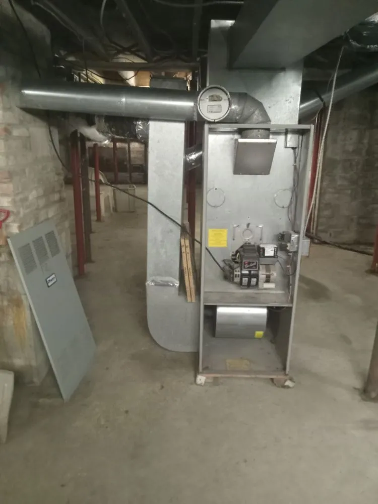 Slide of Kuhn Building services