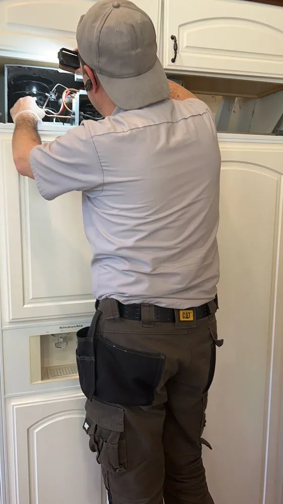 Slide of L-One Appliance Repair