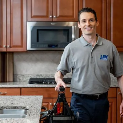 Len the Plumber Logo