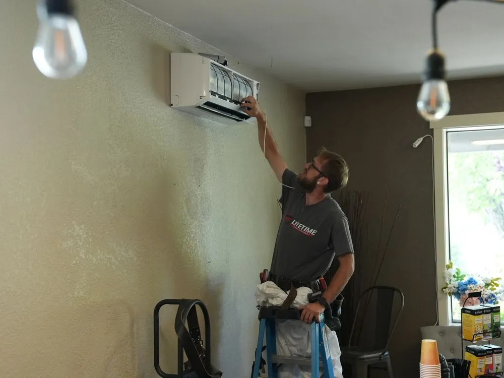 Slide of Lifetime Heating, Cooling, Plumbing and Electric