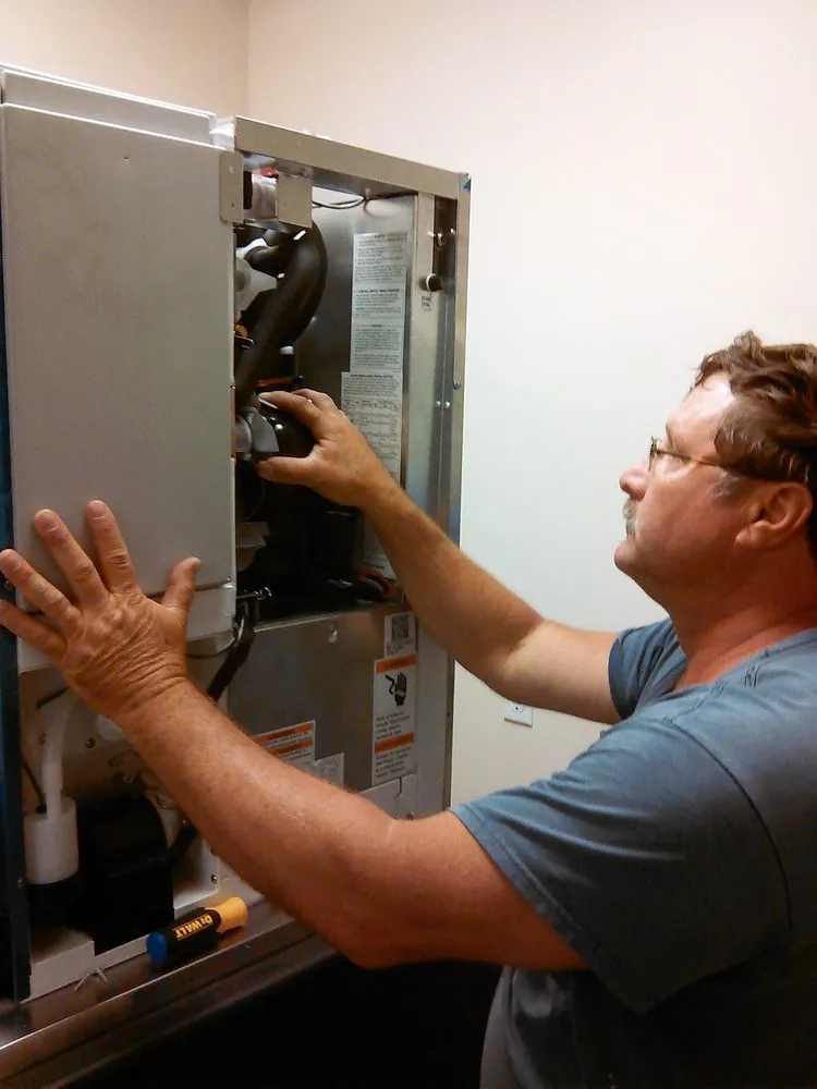 Slide of Louis Nesby Air & Heat