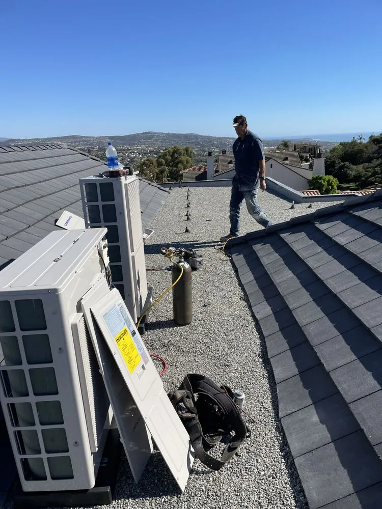 Slide of Lou’s Heating And Air Conditioning