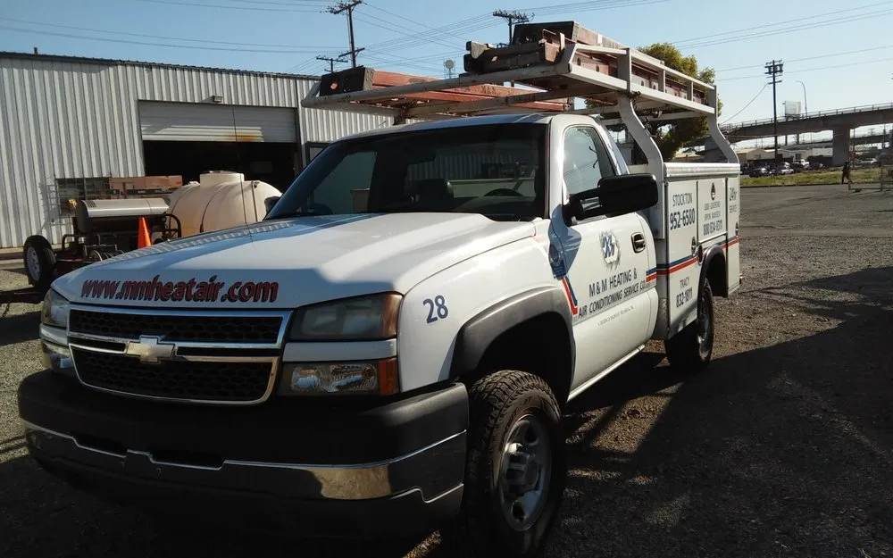 Slide of M & M Heating & Air Conditioning Service