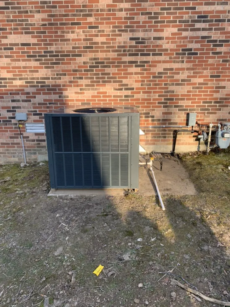 Slide of M C Heating and Air