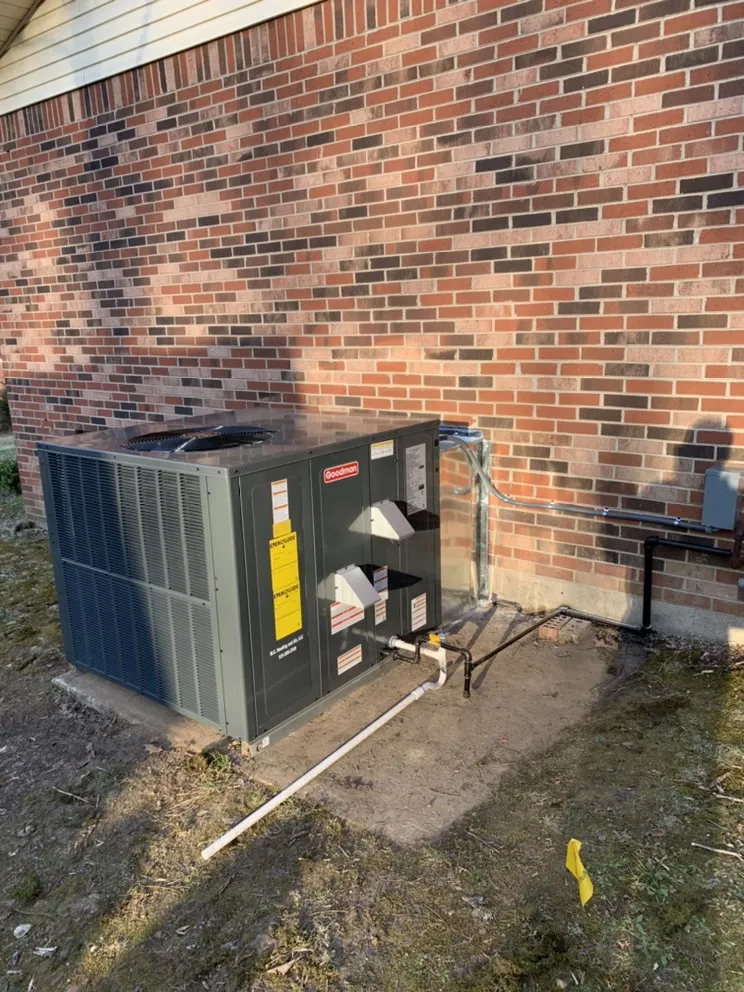 Slide of M C Heating and Air