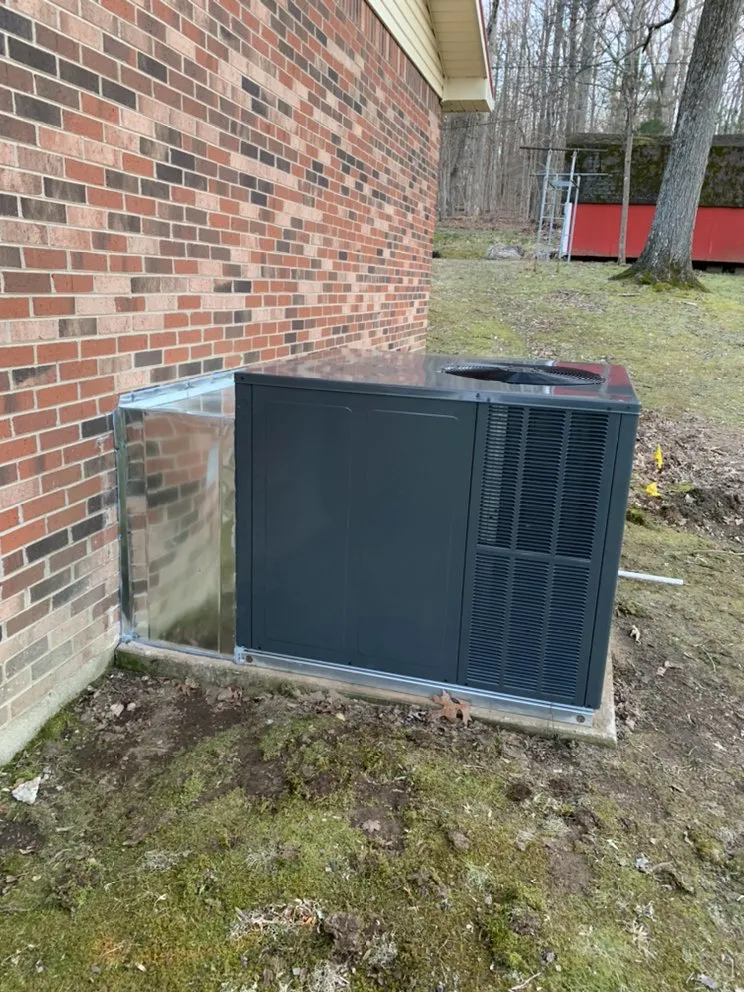 Slide of M C Heating and Air