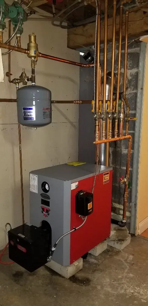 Slide of Mack's Heating and Air Conditioning