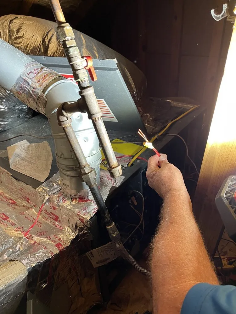 Slide of Mac's Heating & Cooling