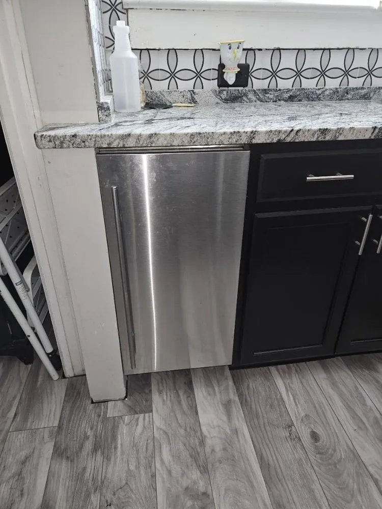 Slide of Mac’s Home Services