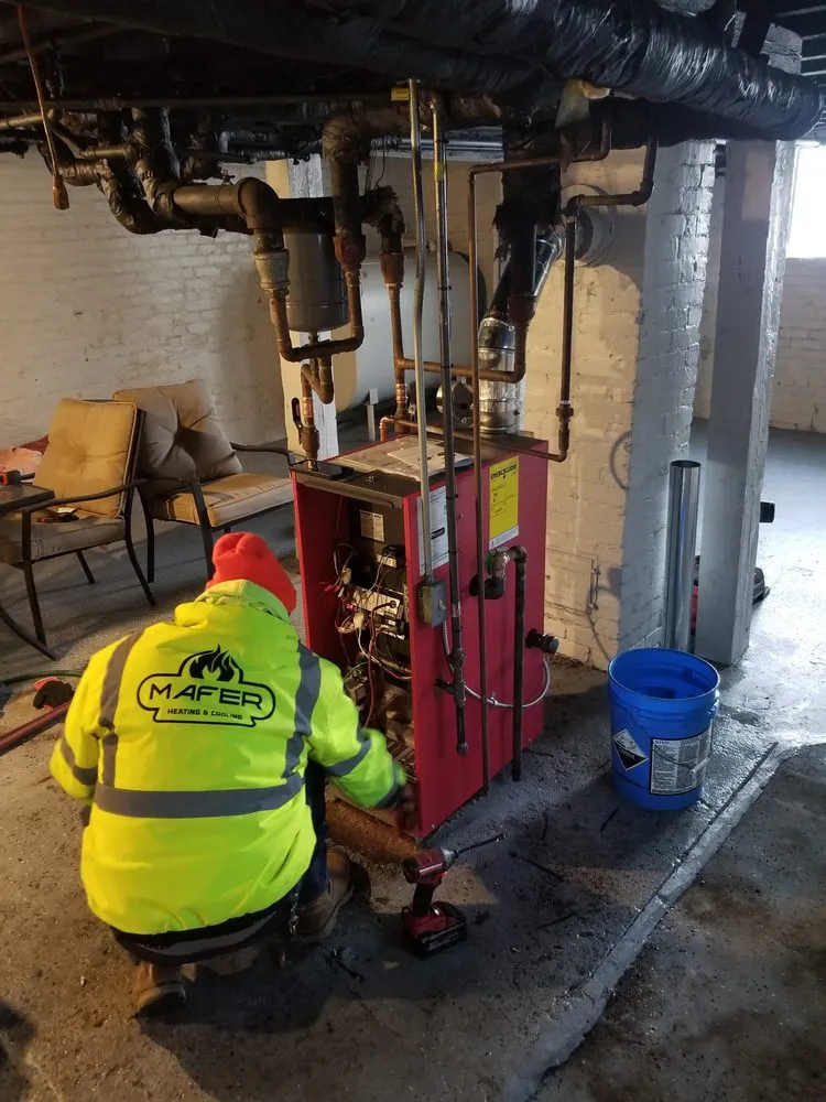 Slide of Mafer Economy Heating & Cooling