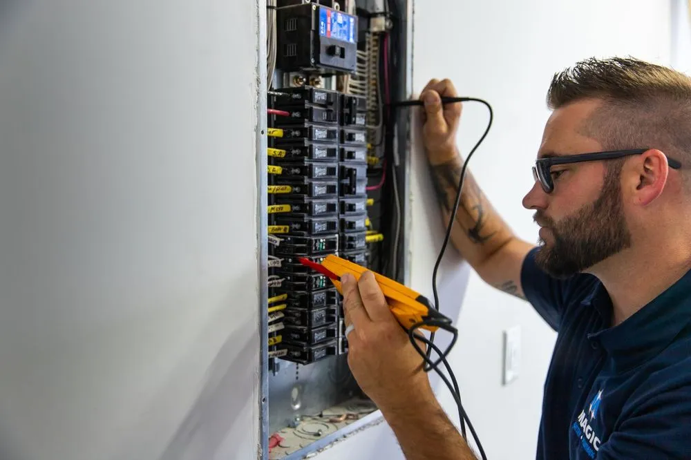 Slide of Magic Electric, Plumbing, Heating + Air