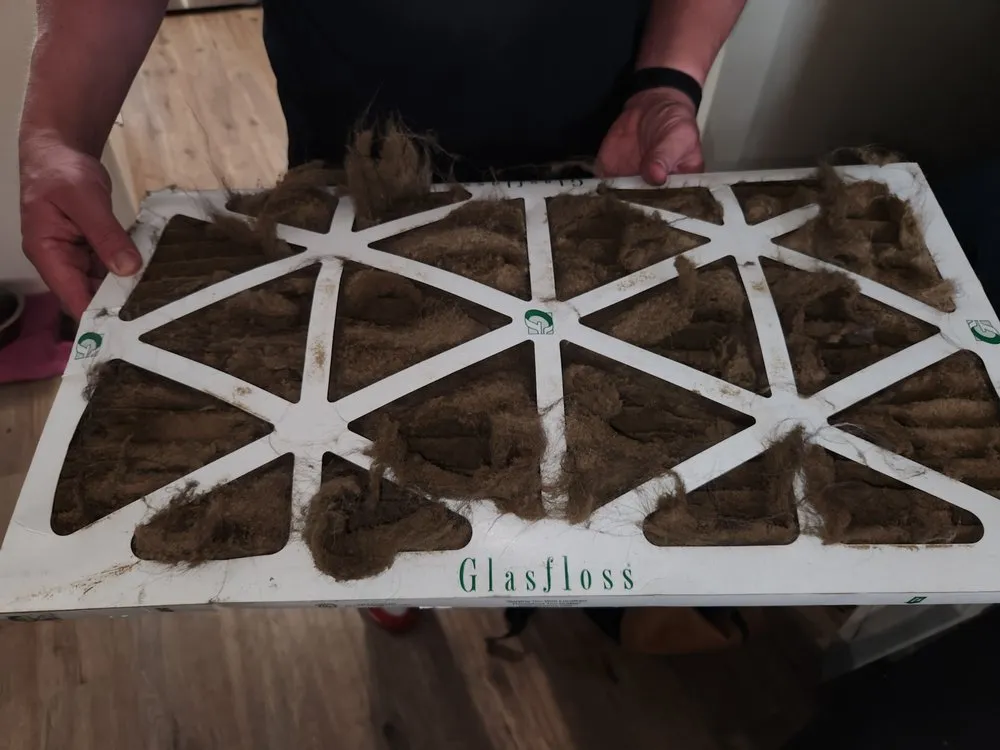 Slide of Malcolm's Heating & Air