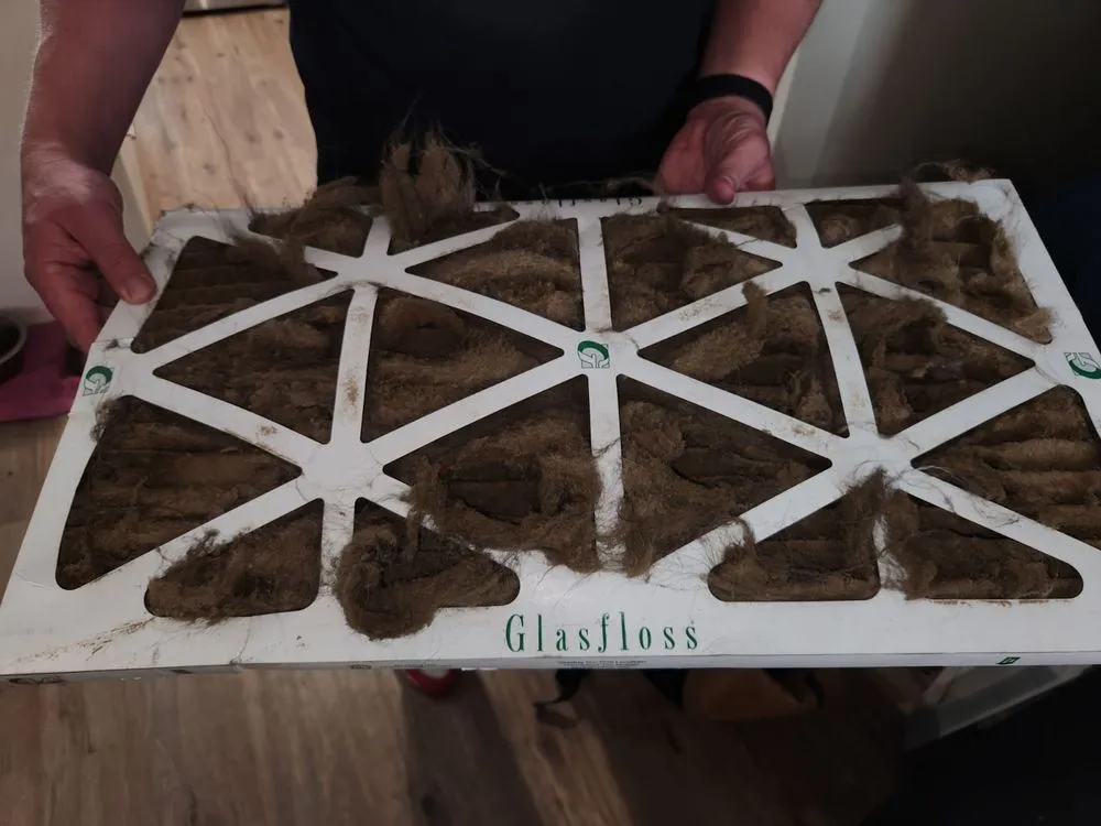 Slide of Malcolm's Heating & Air