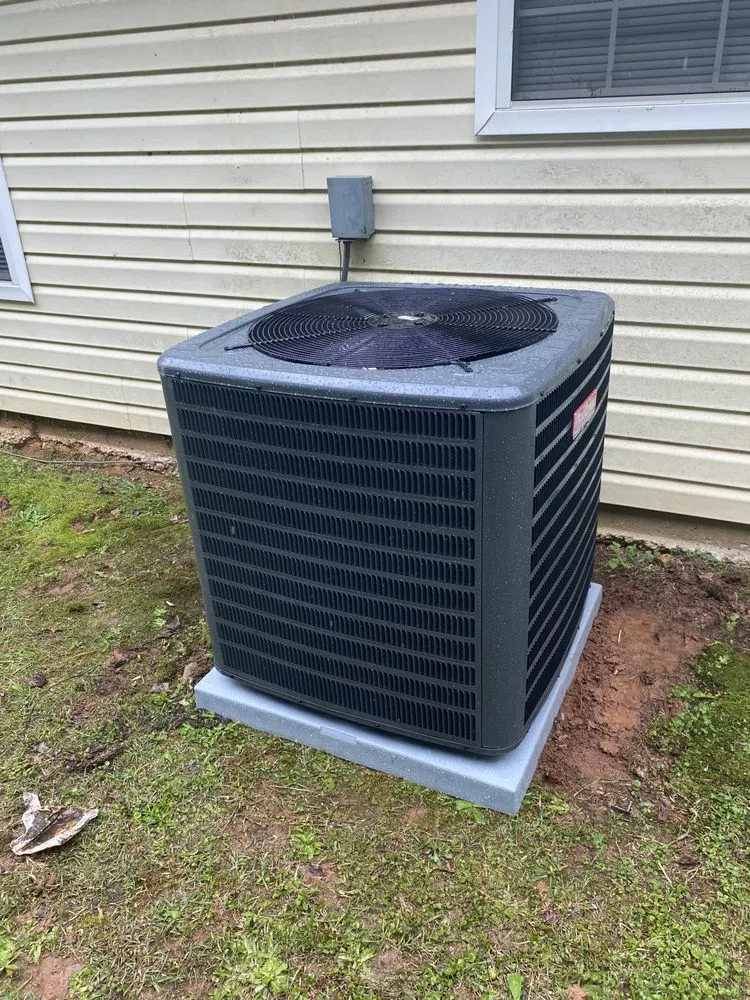 Slide of Maliks Heating and Air