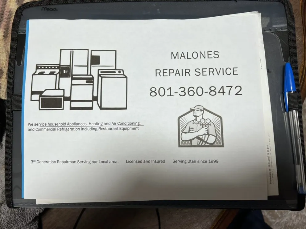 Slide of Malone’s Repair Service