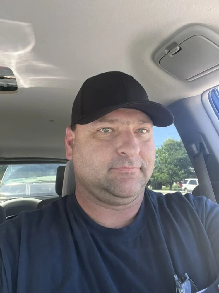 Slide of Malone’s Repair Service