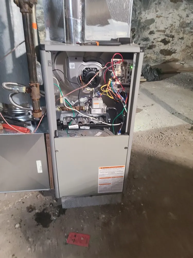 Slide of Manny Heating and Air Conditioning