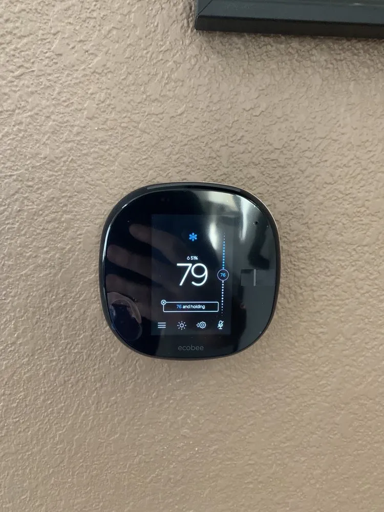 Slide of Manny's Heating and Air