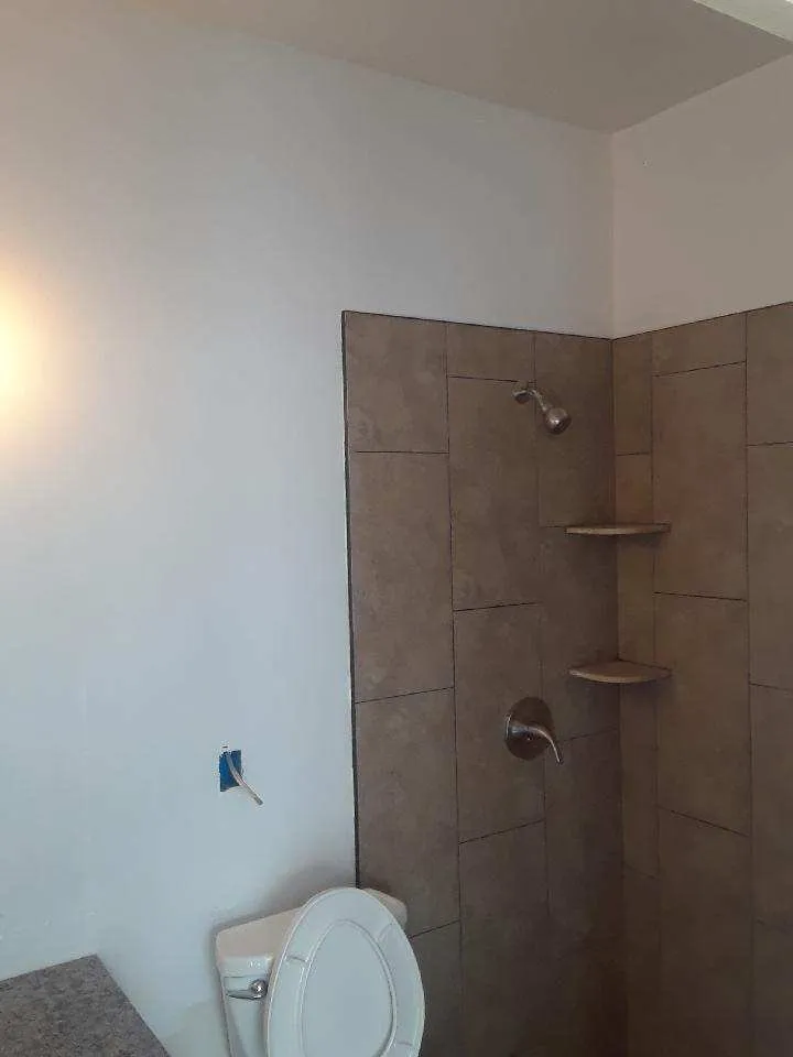 Slide of Manríquez Custom Design