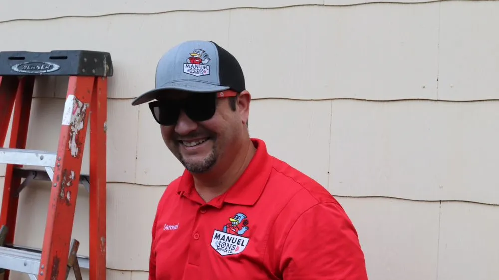 Slide of Manuel & Sons Service