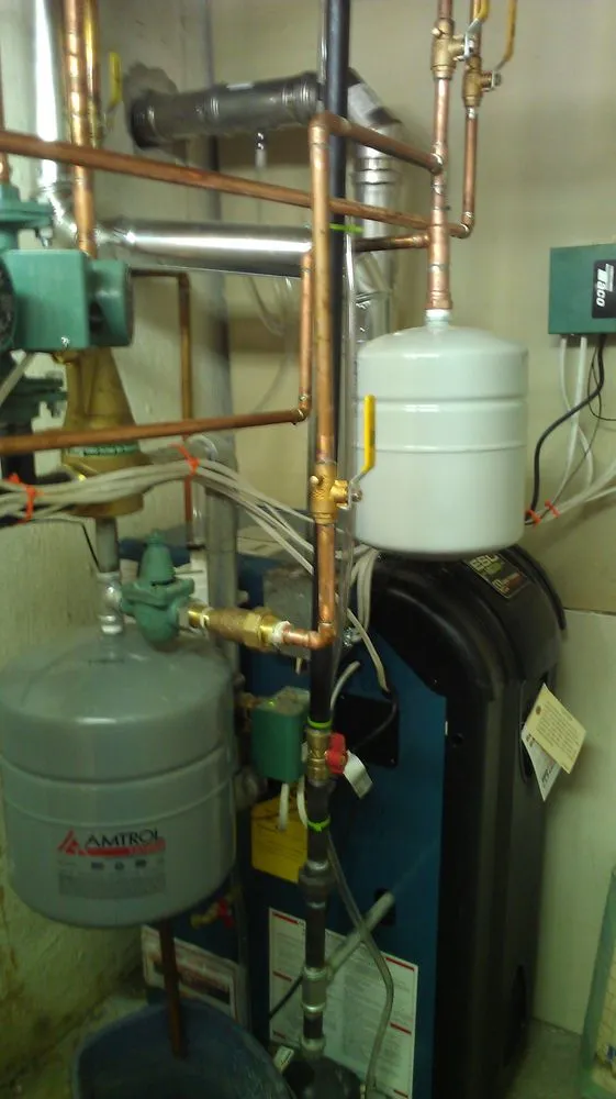 Slide of McIntosh Plumbing & Heating