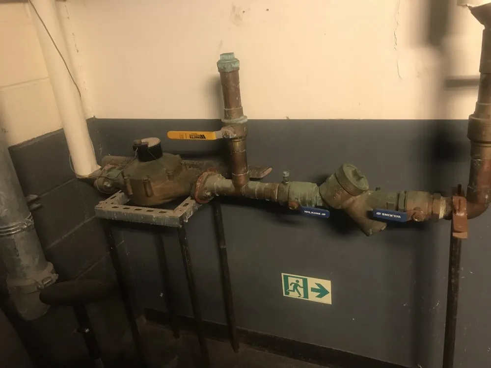 Slide of Mekons Plumbing & Heating Services