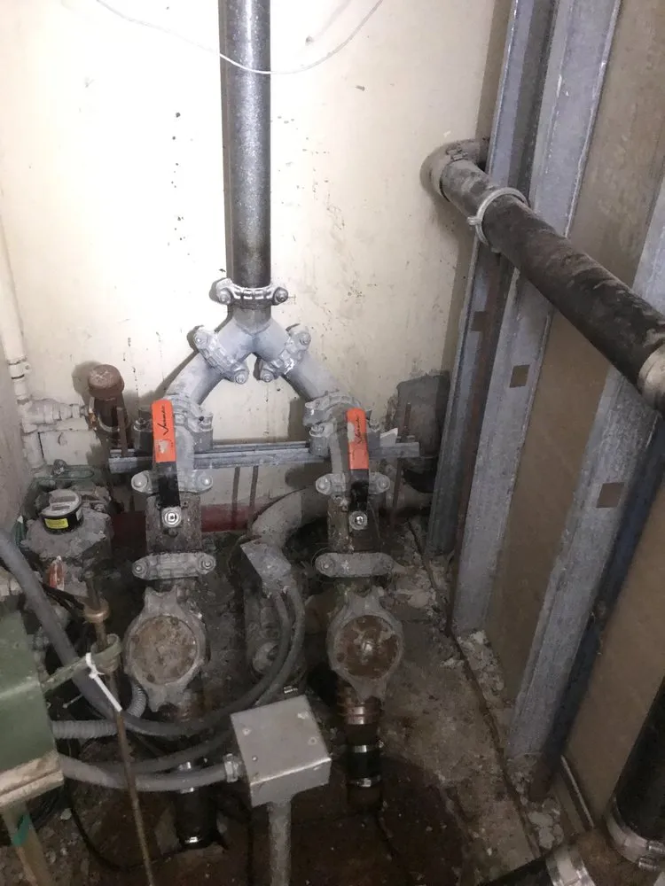 Slide of Mekons Plumbing & Heating Services