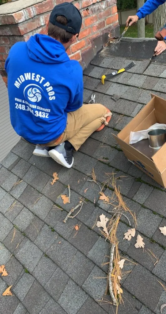 Slide of Midwest Pros Gutter Cleaning Roofing Heating Cooling