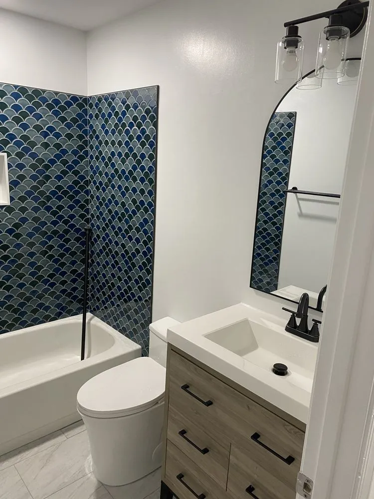 Slide of Miguel's Home Improvement