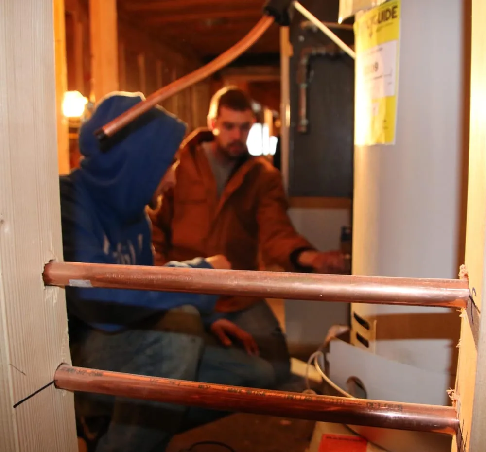 Slide of Mike & Wife Plumbing, Heating & Cooling